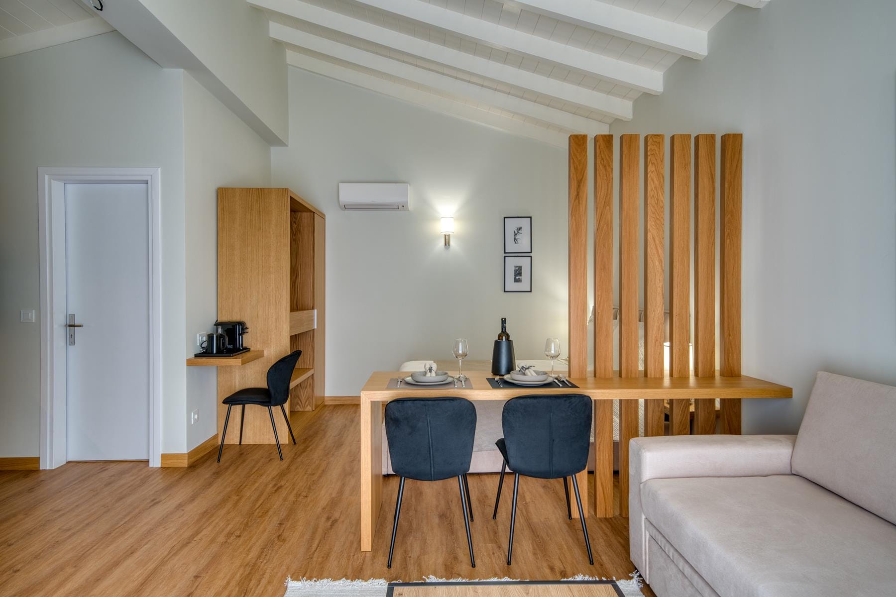 a room with a table and chairs