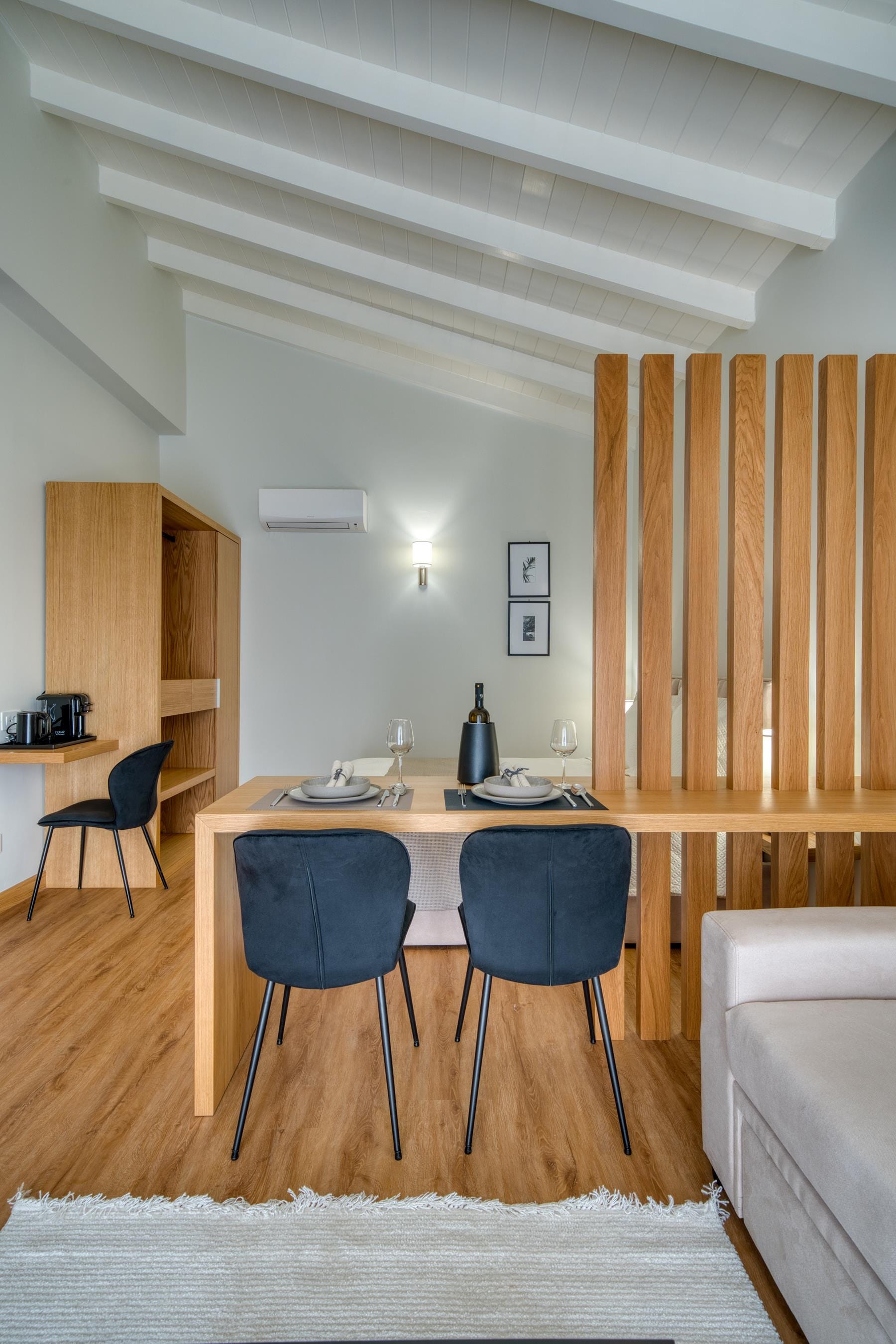 a room with a table and chairs