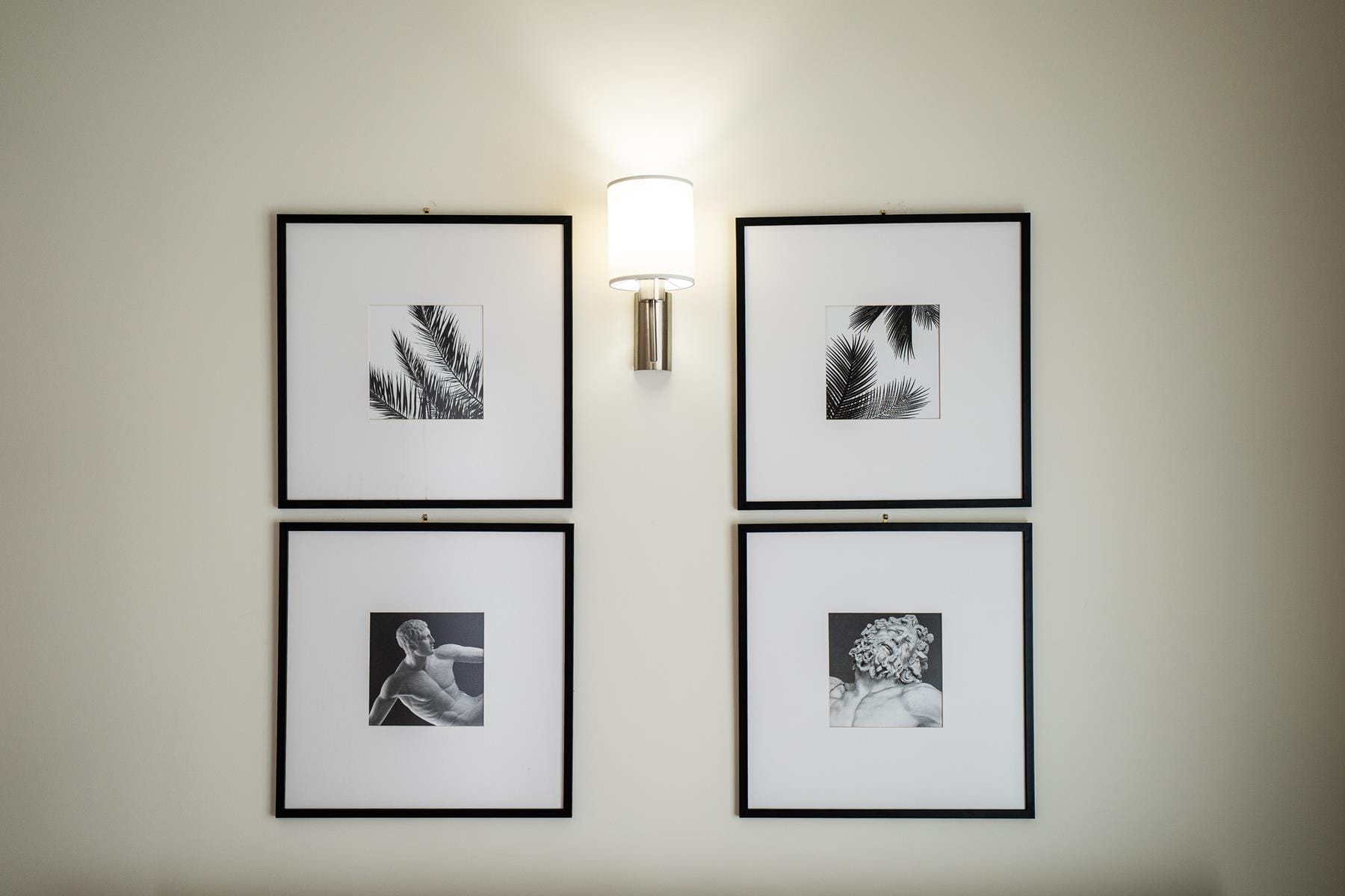 a wall with pictures on it