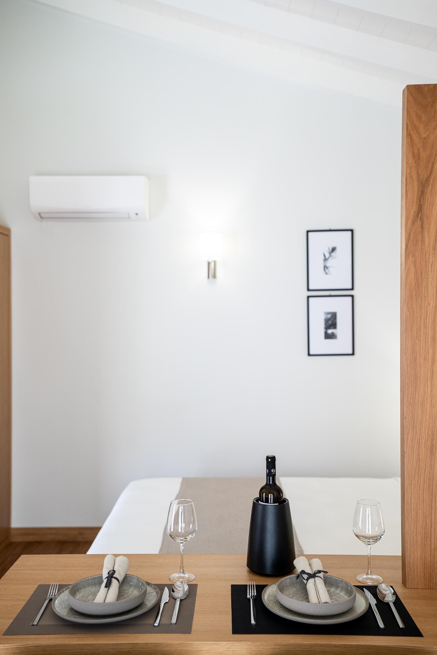 a table with glasses and plates