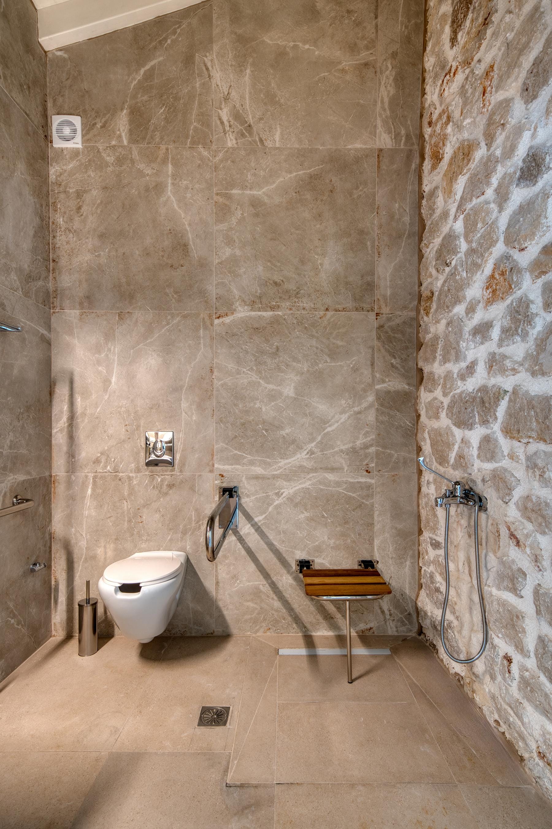 a bathroom with a toilet and a sink