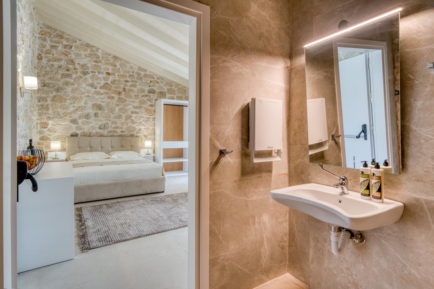 a bathroom with a tub sink and a bathtub