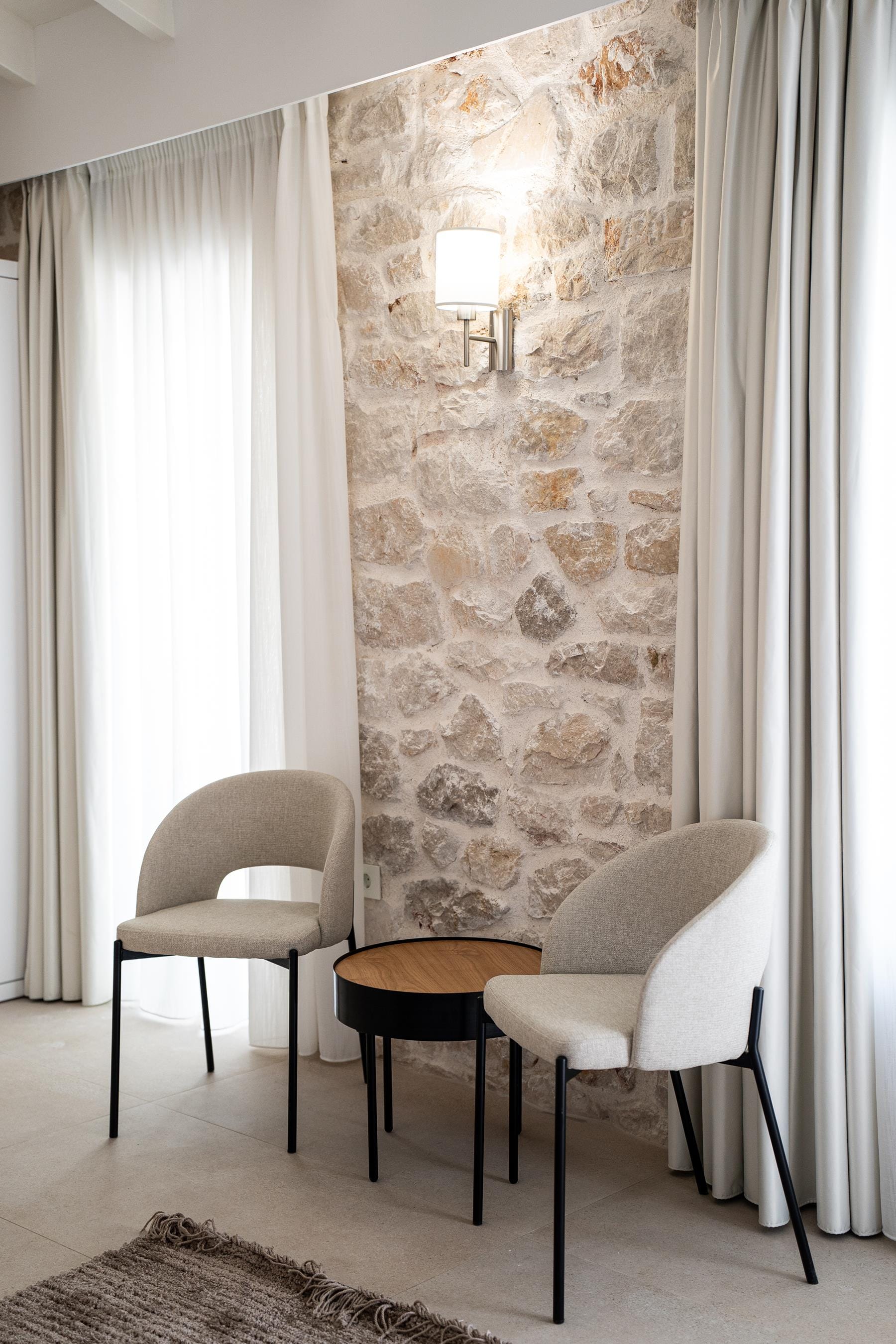 a room with a table and chairs