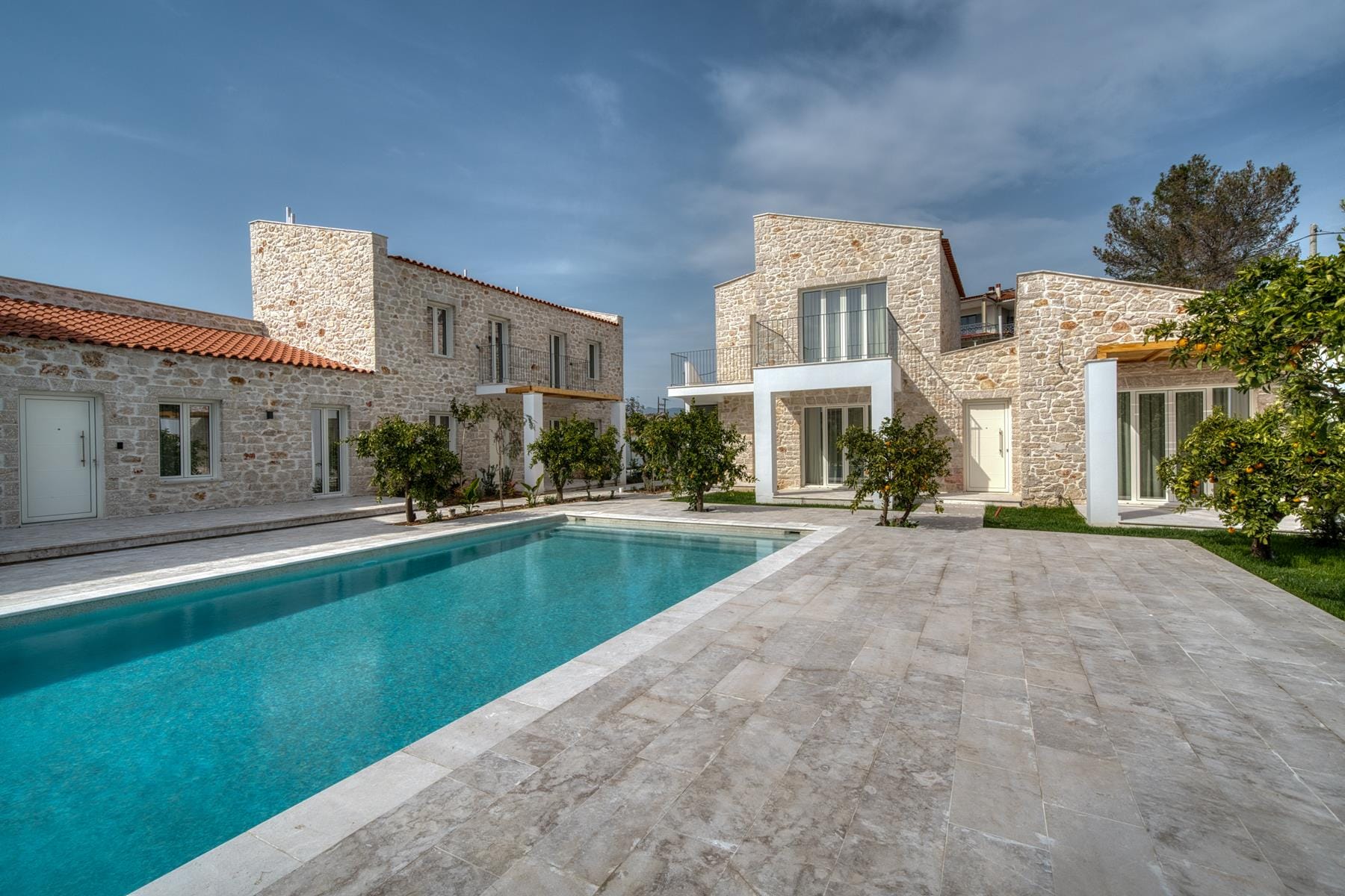 a large building with a pool