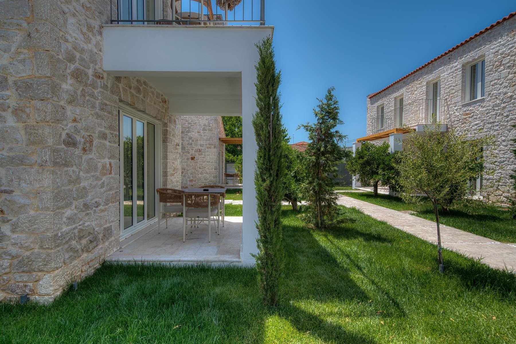 a house with a patio and trees