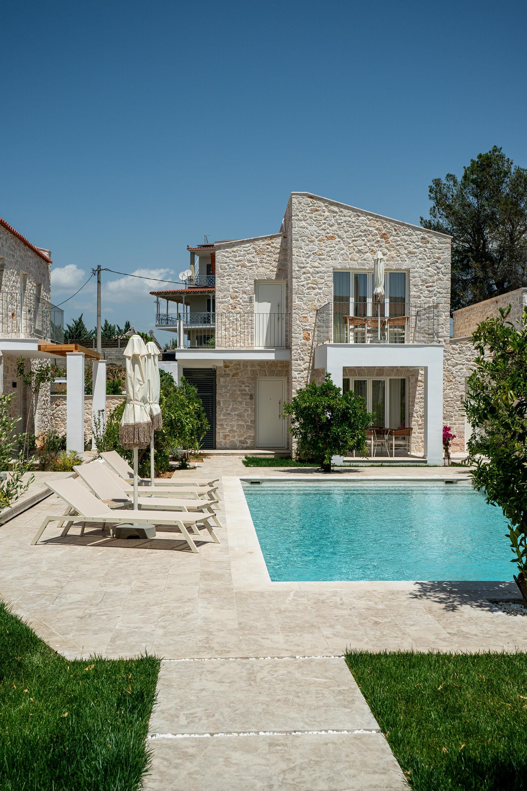 a large house with a pool
