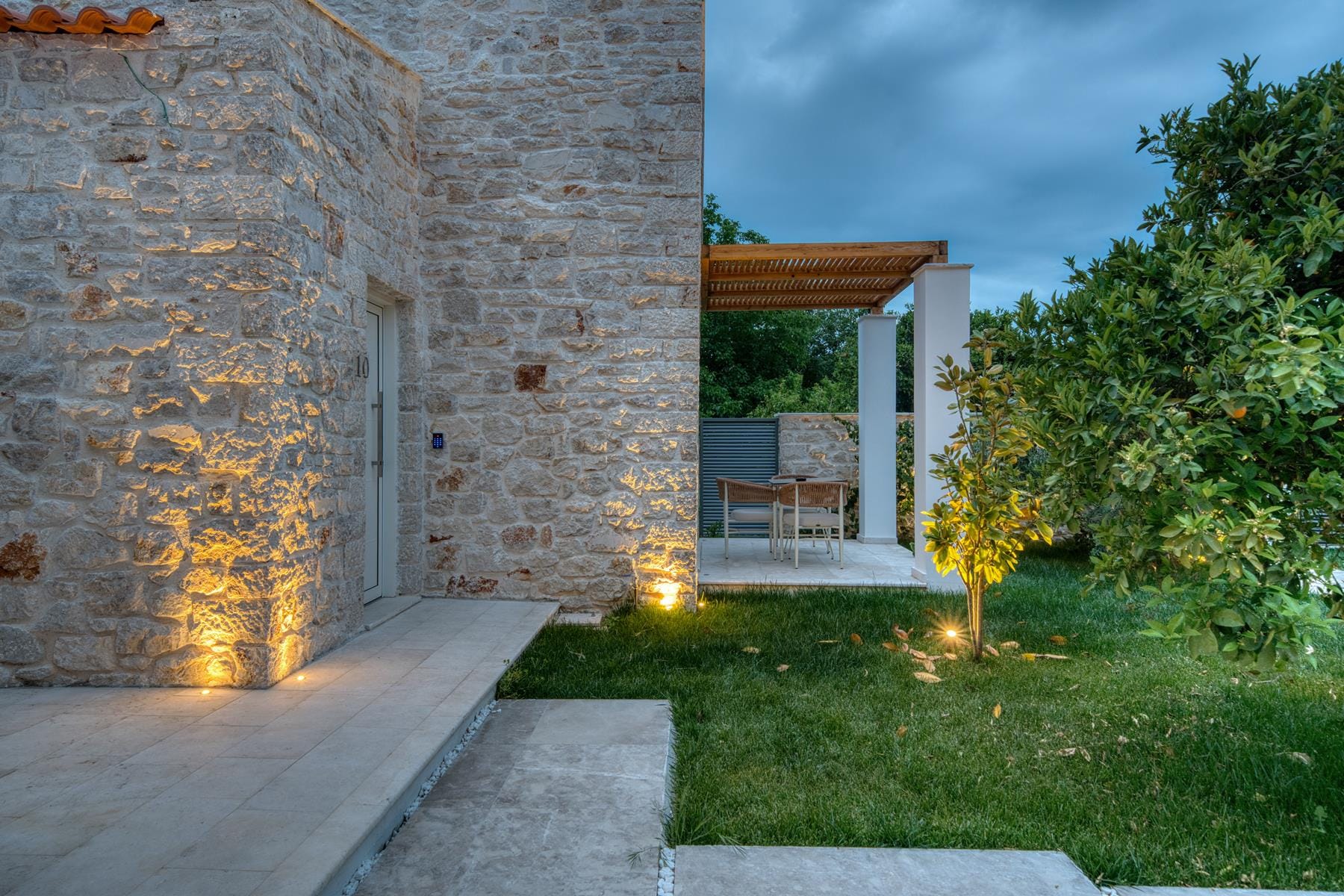 a stone building with a fire pit