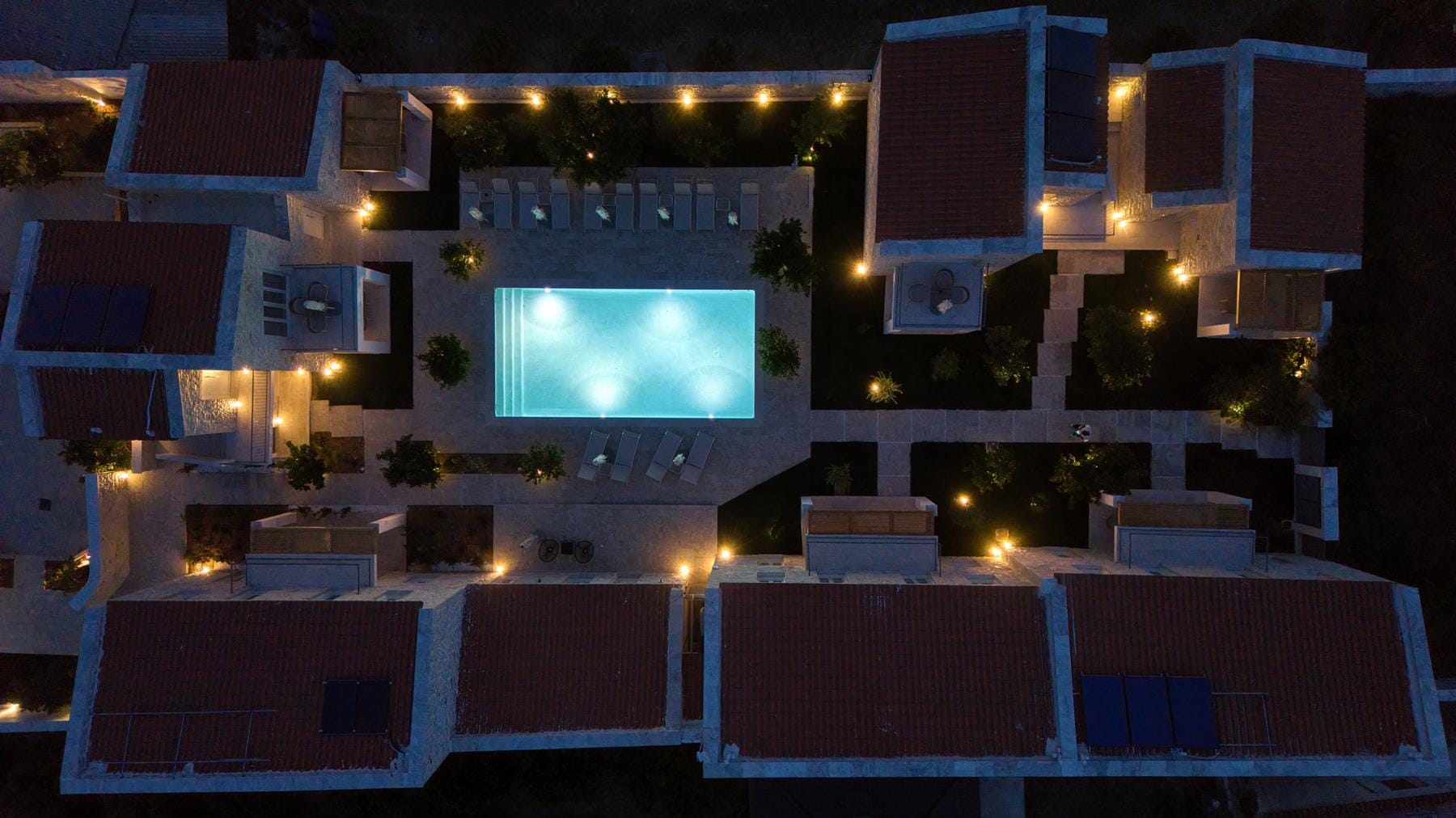 a room with chairs and a screen