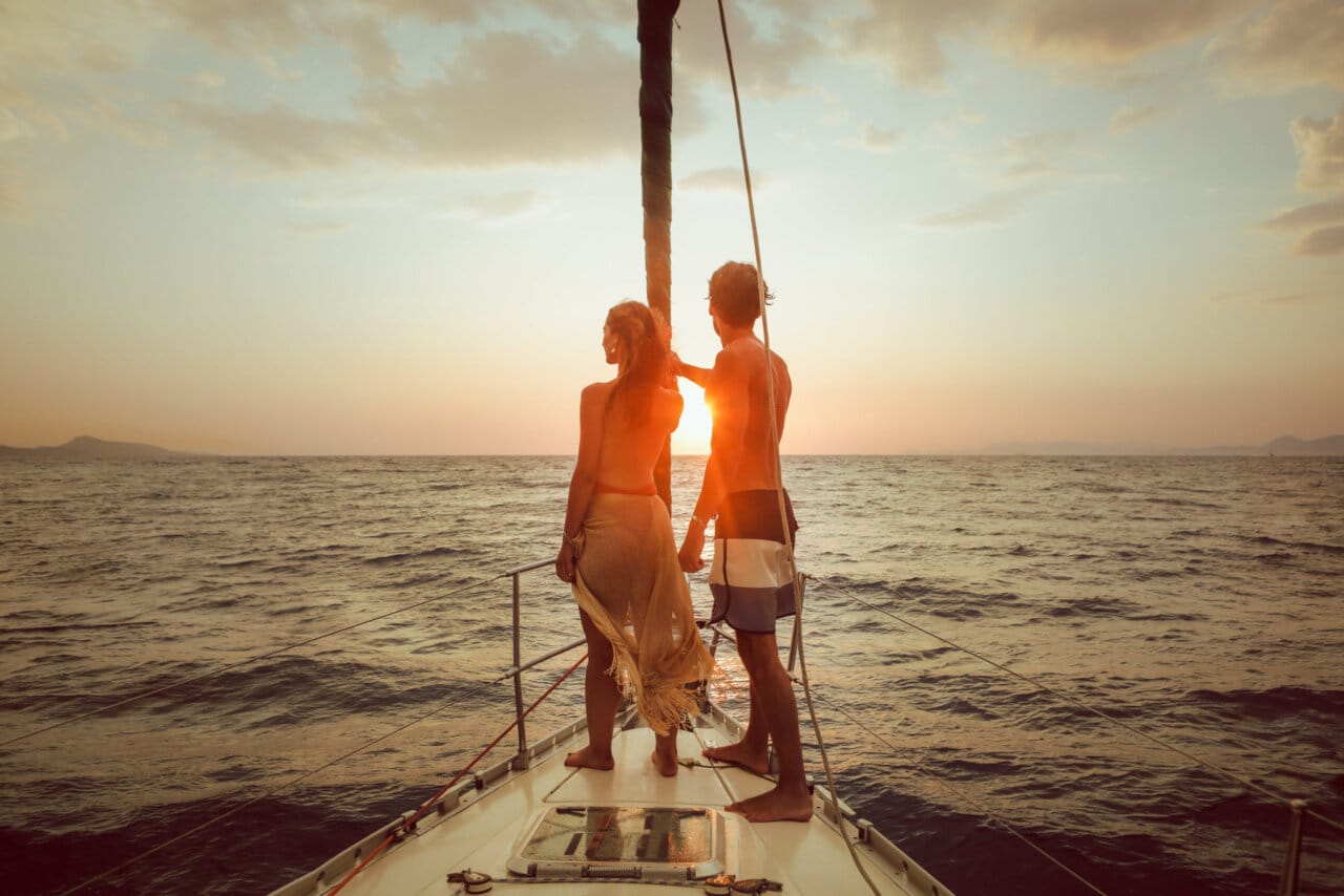 a man and woman on a boat