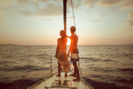 a man and woman on a boat