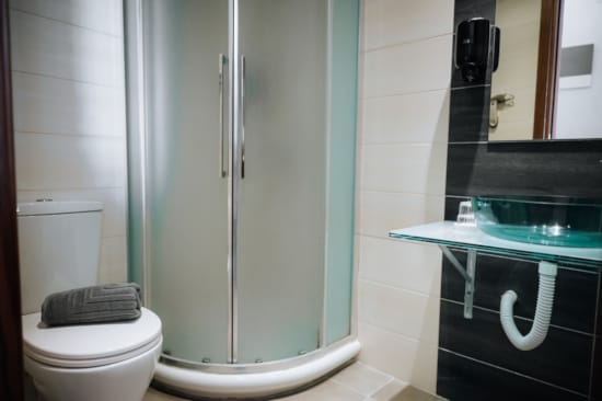 a bathroom with a glass shower