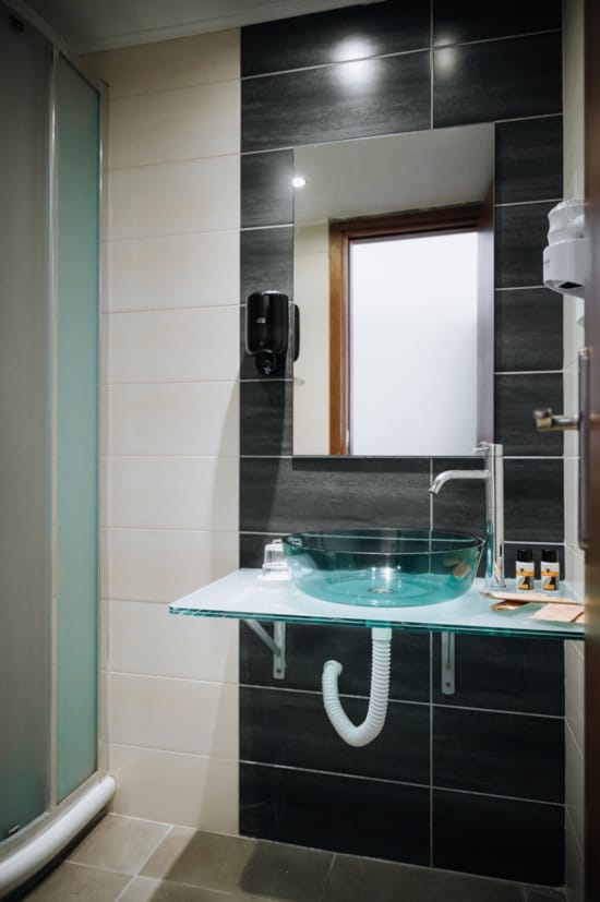 a bathroom with a glass shower