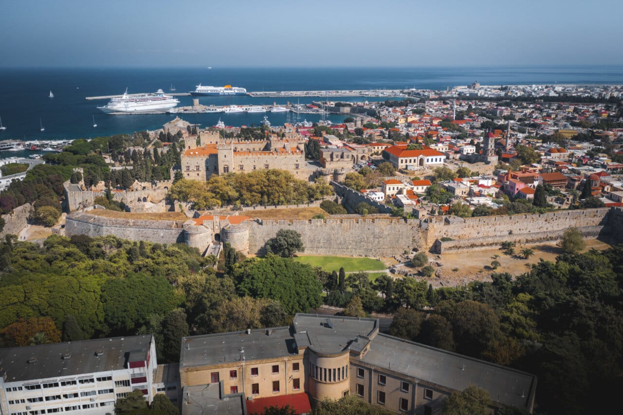 a city with many buildings and trees