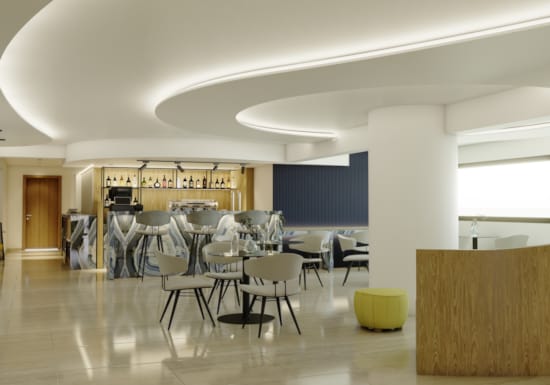 a room with a table and chairs