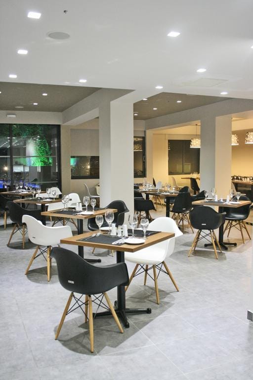 a room with tables and chairs