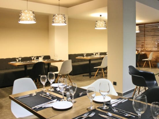 a room with tables and chairs