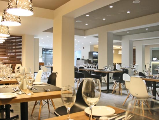 a room with tables and chairs