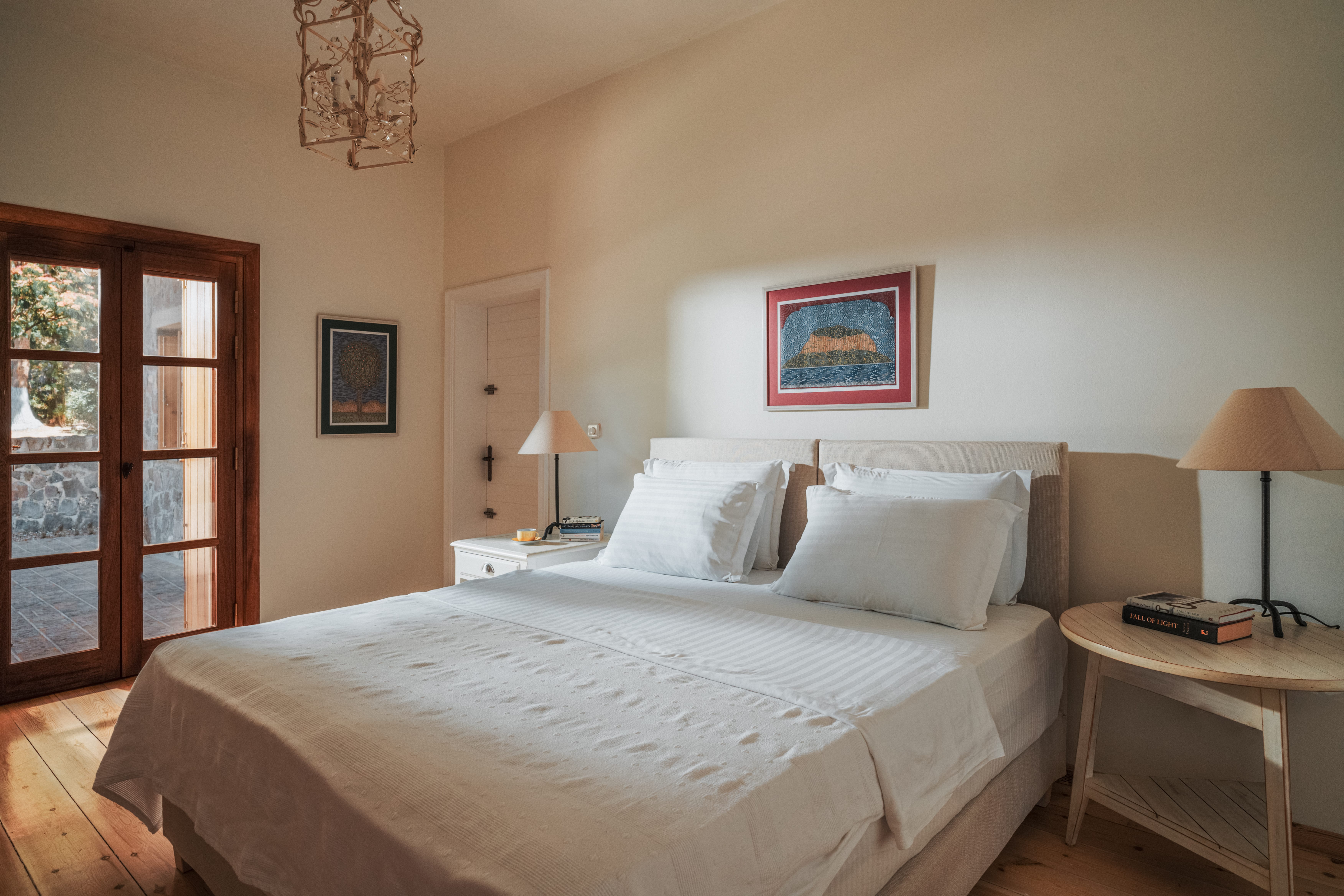 a bed with white sheets