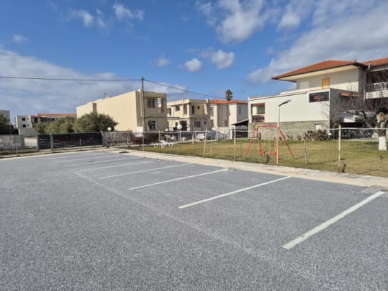 a tennis court with a fence