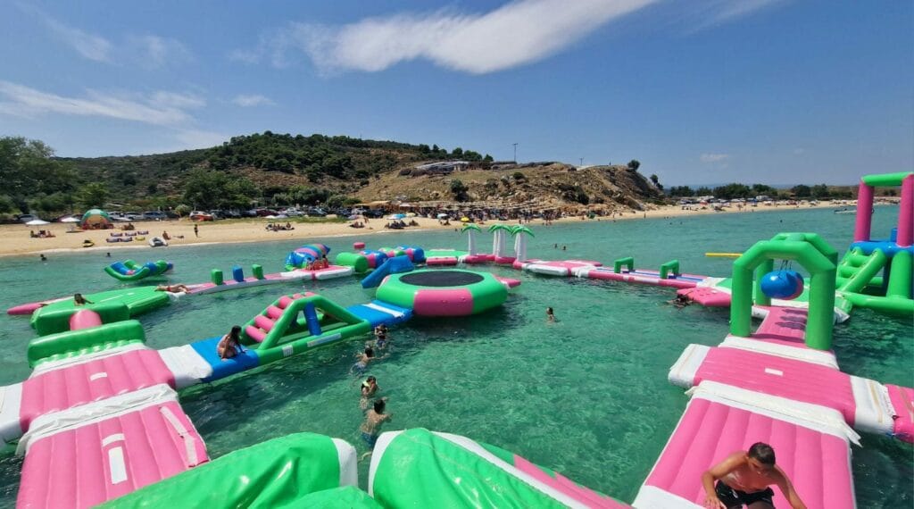 a group of boats on a beach