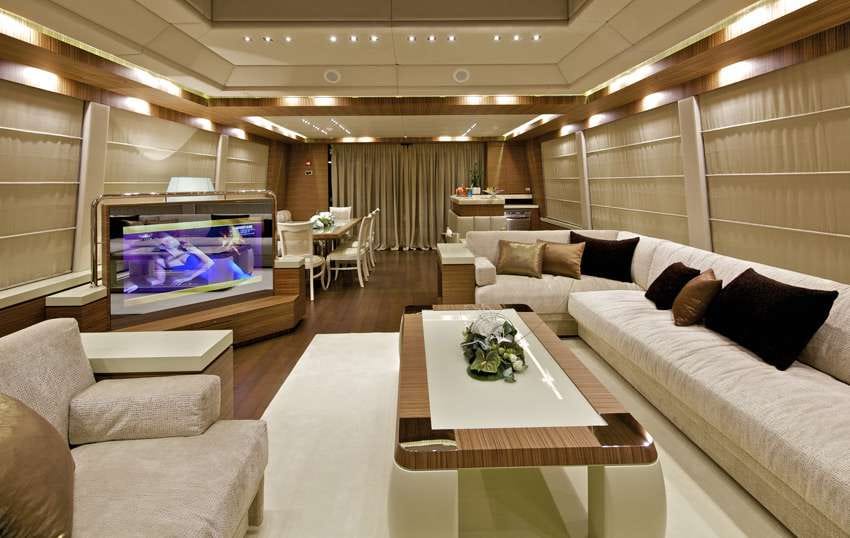 a living room with a tv and couches