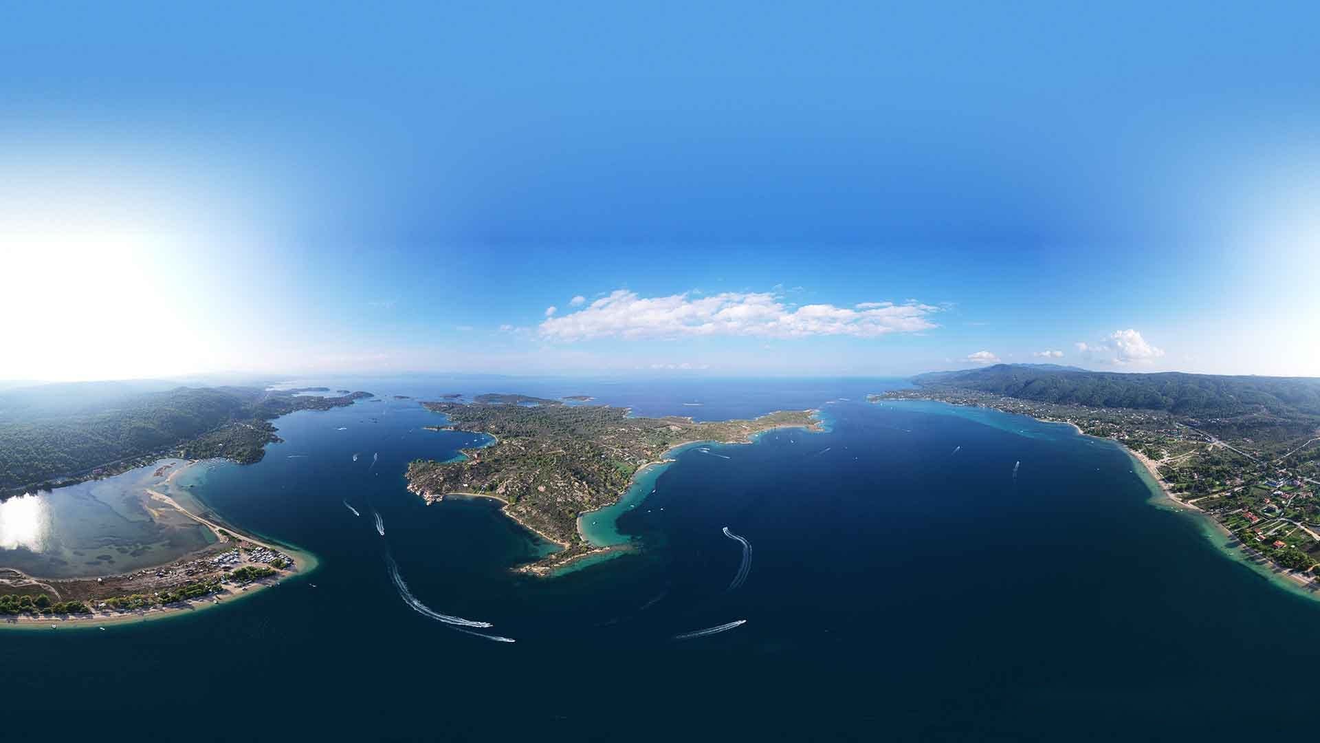 a large body of water with land around it