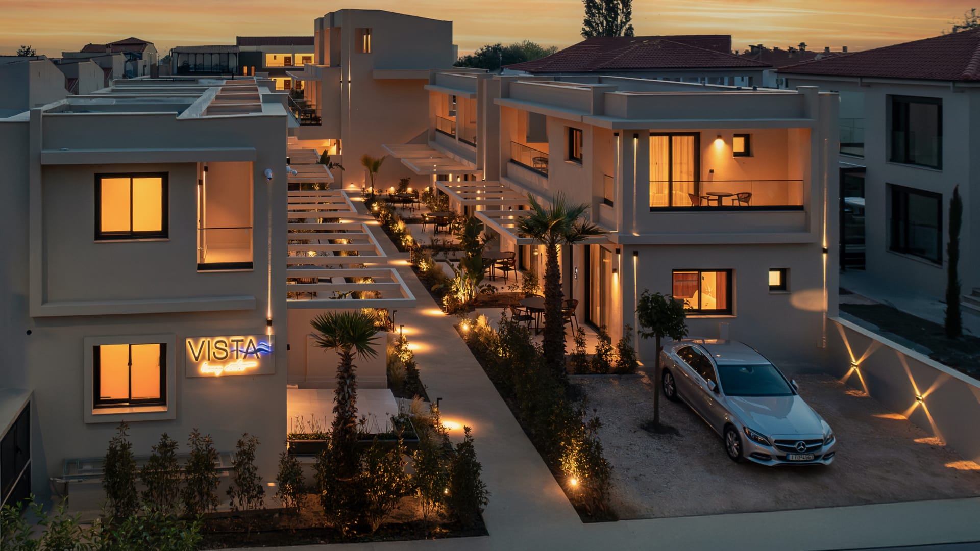 a house with a car parked in the driveway