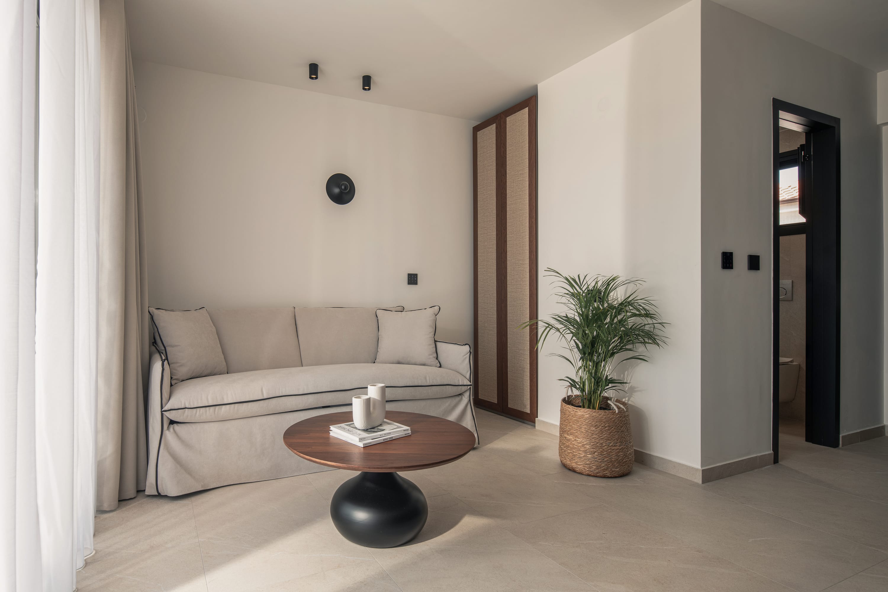 a living room with a white couch