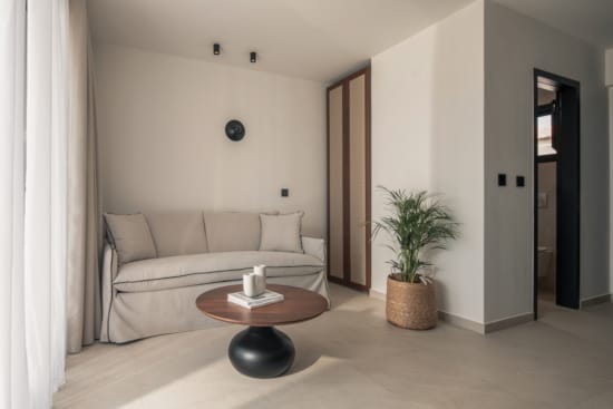 a living room with a white couch