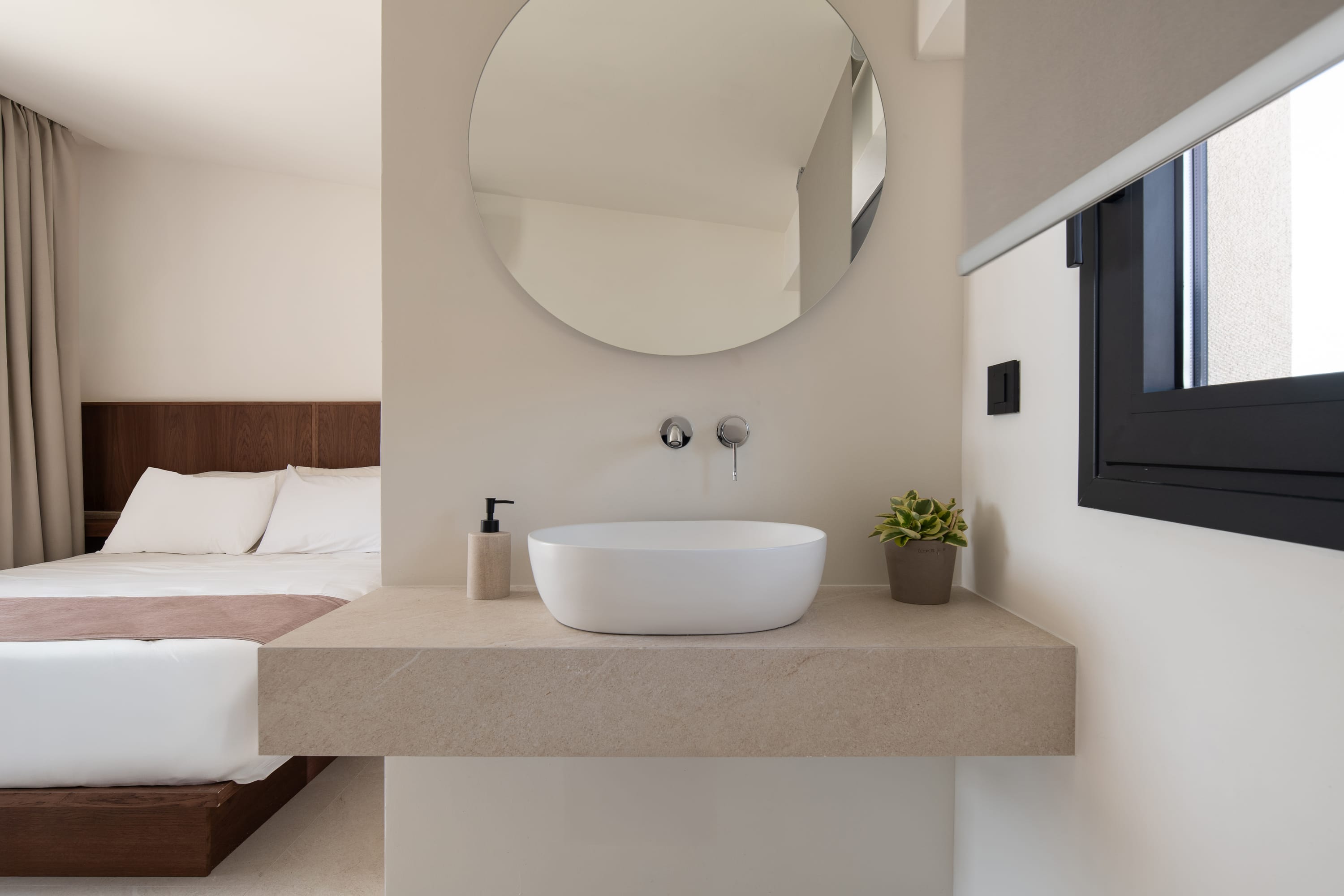 a bathroom with a tub and sink