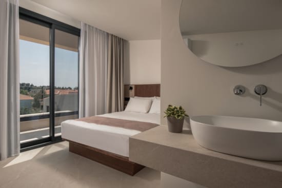 a bathroom with a tub and a bathtub