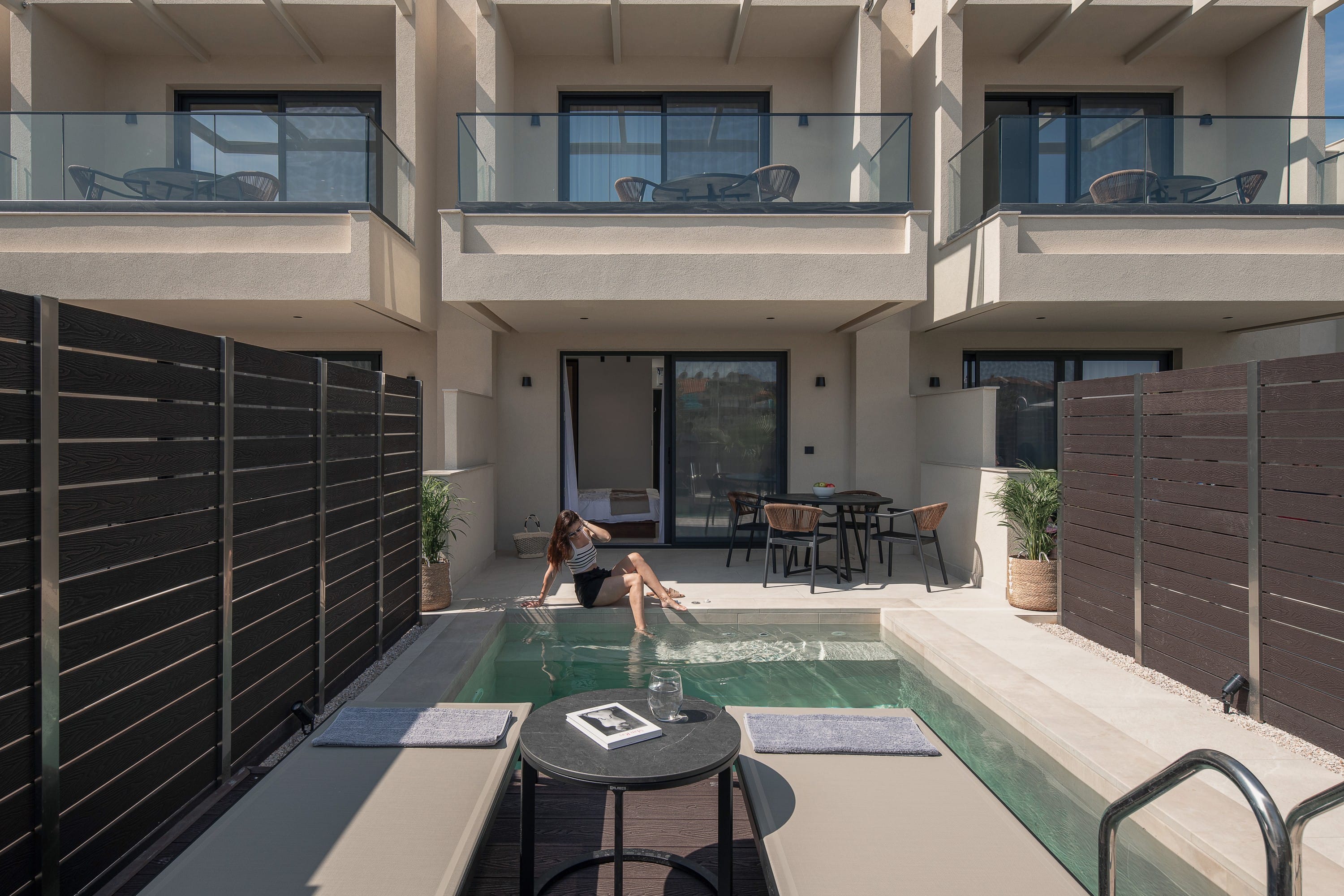 a person lying on a table outside a building