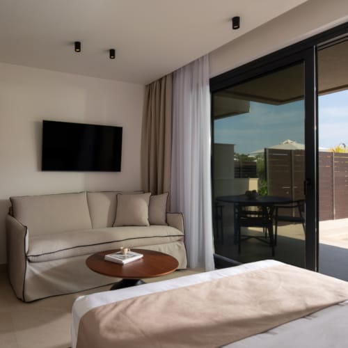 a living room with a large glass door