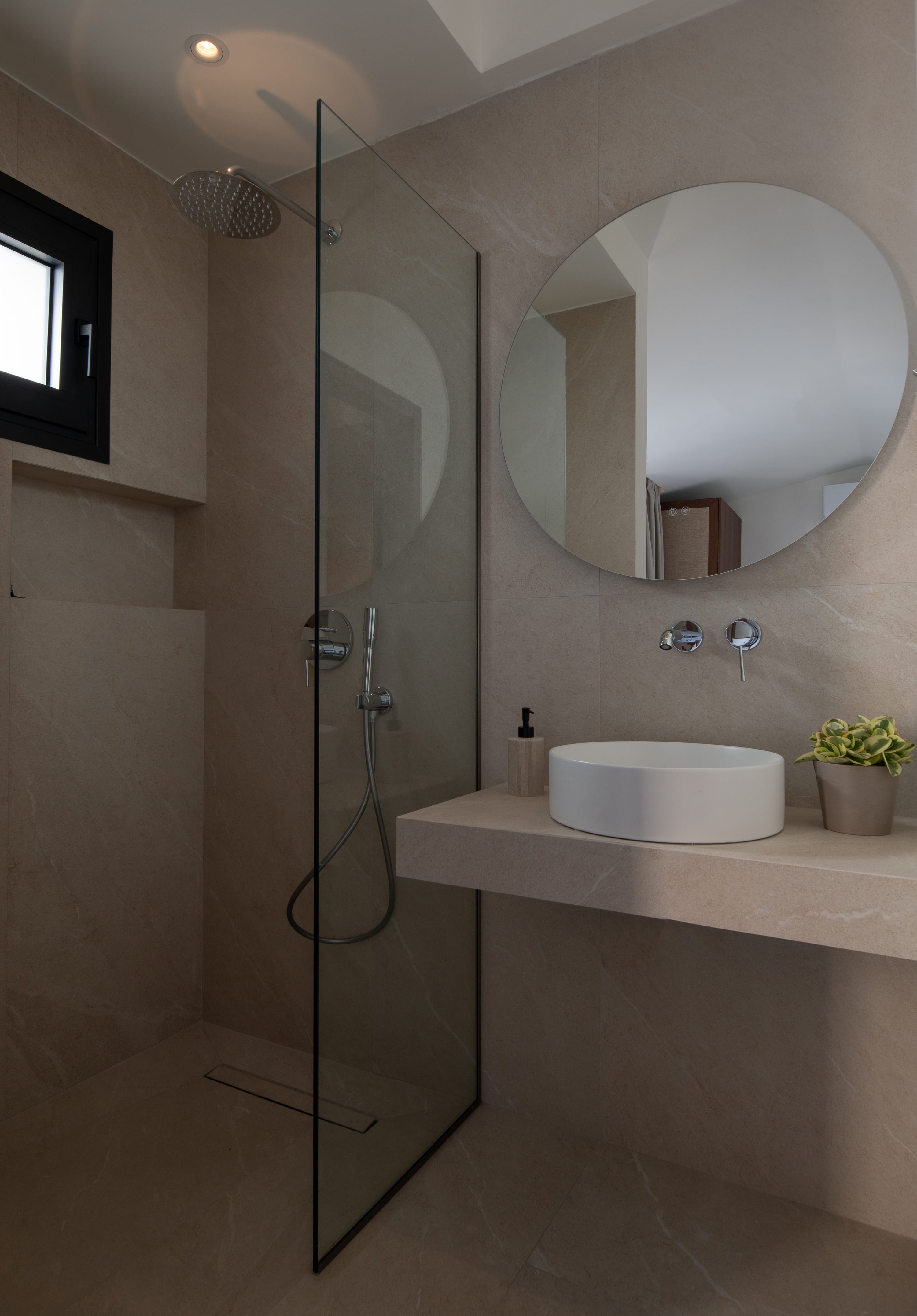 a bathroom with a glass shower