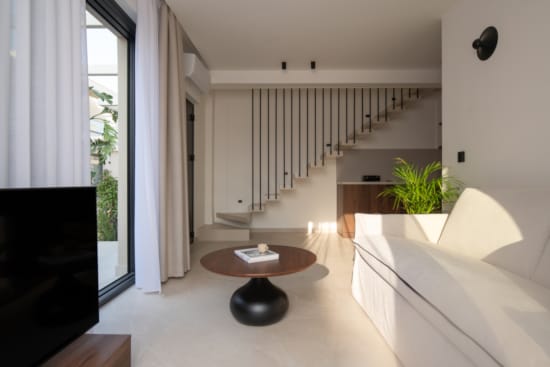 a room with a table and a couch