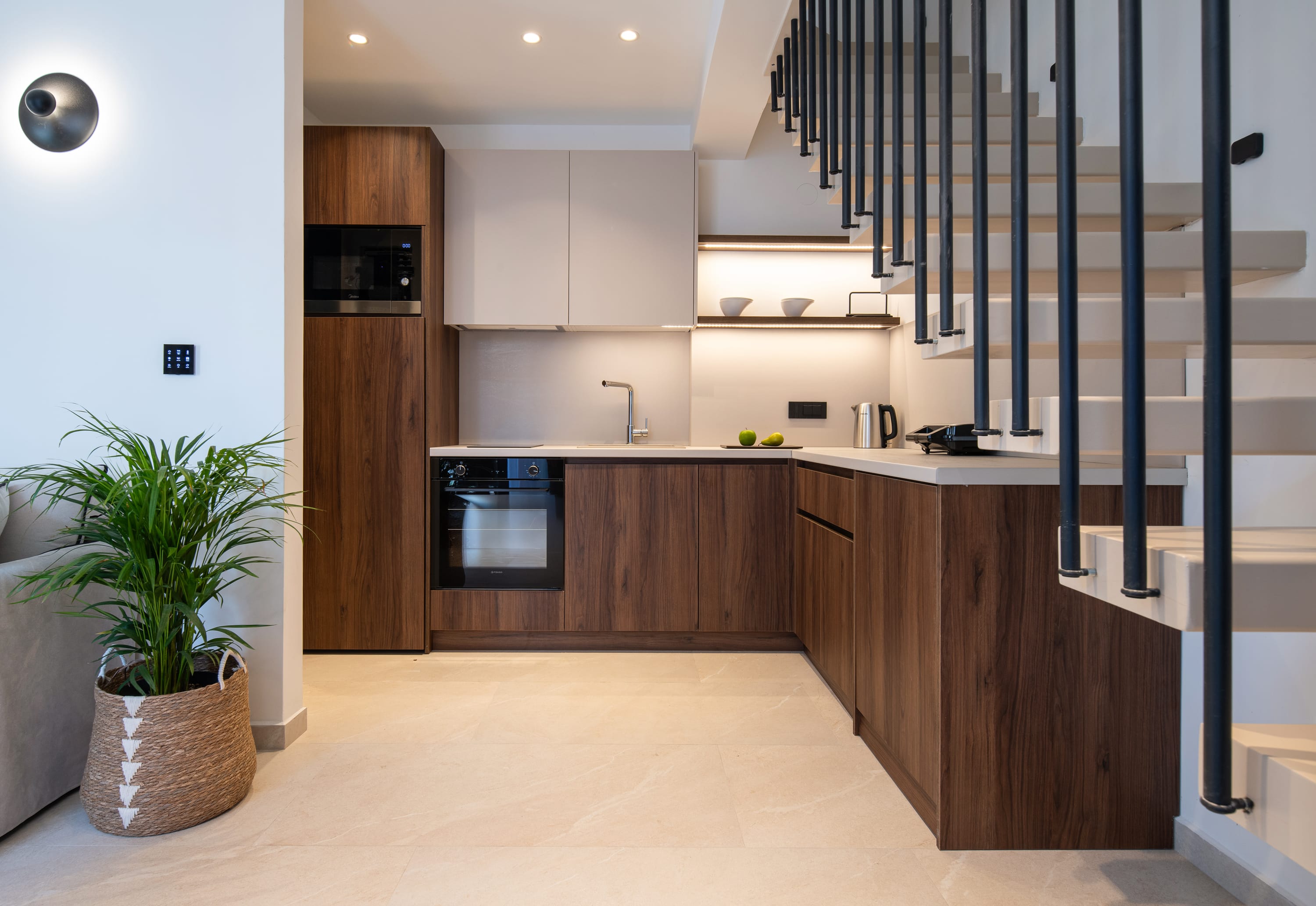 a kitchen with wooden cabinets