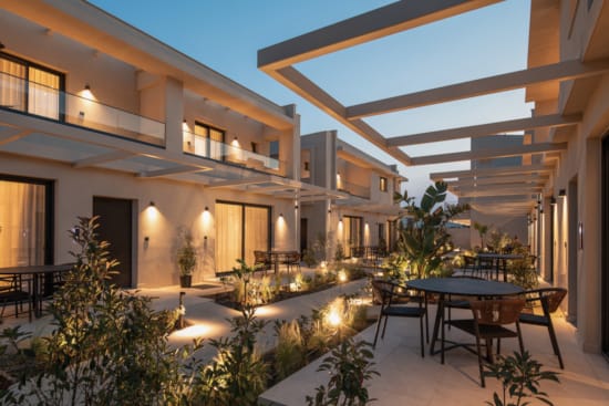 a house with a pool and patio