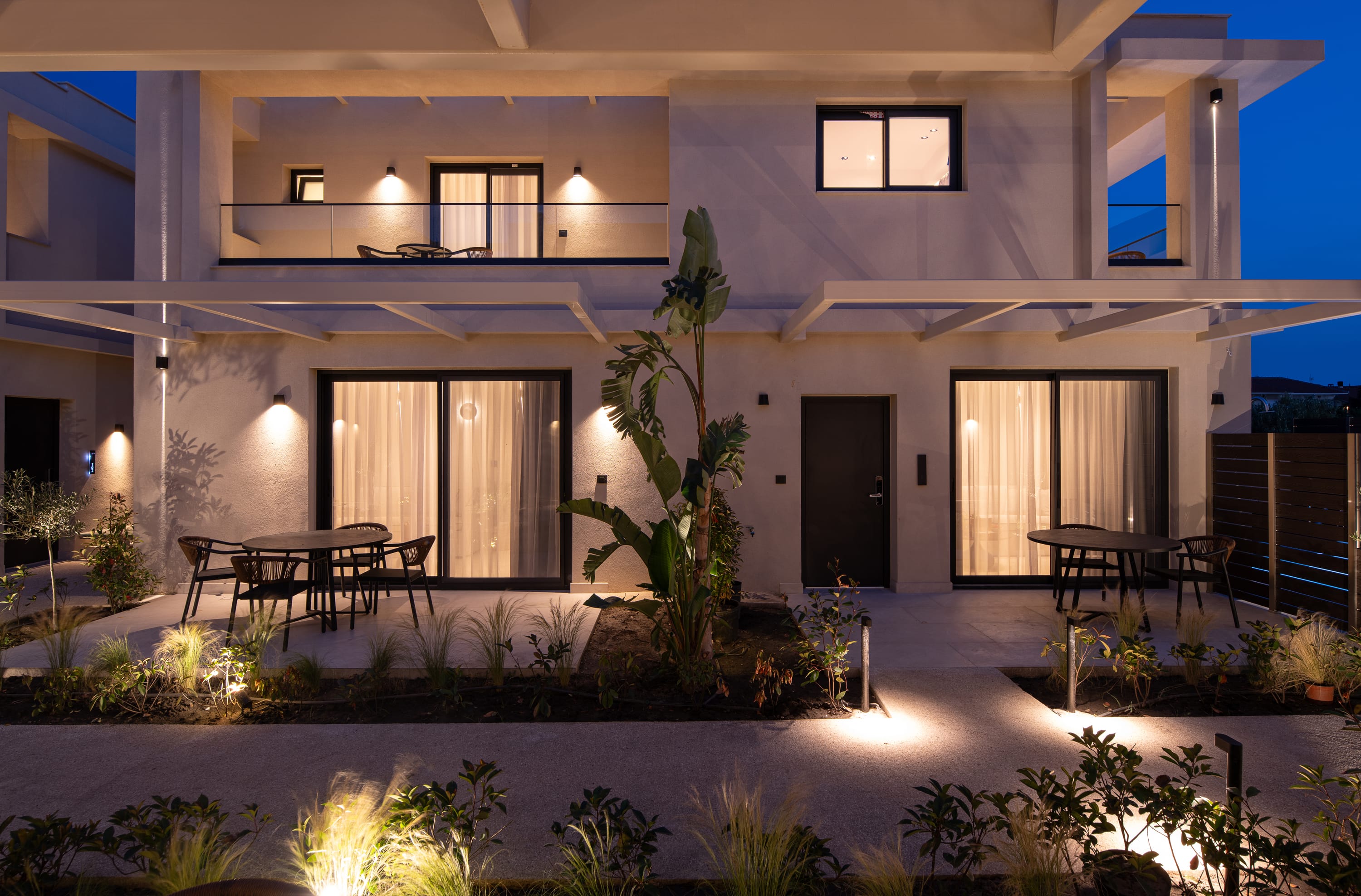 a room with a pool and plants