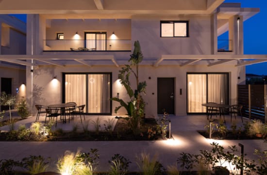 a room with a pool and plants