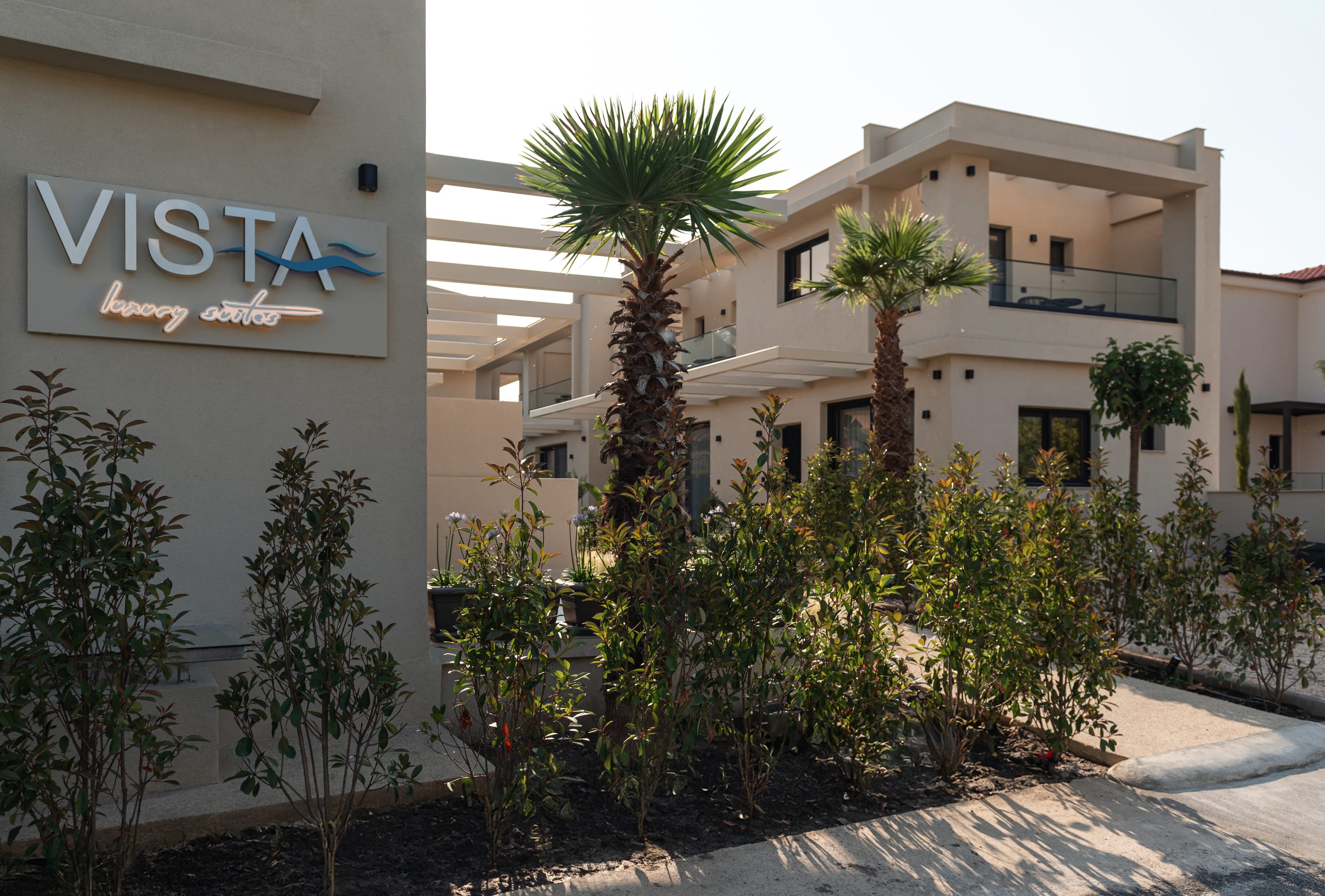 a building with palm trees