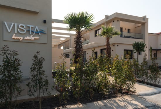 a building with palm trees