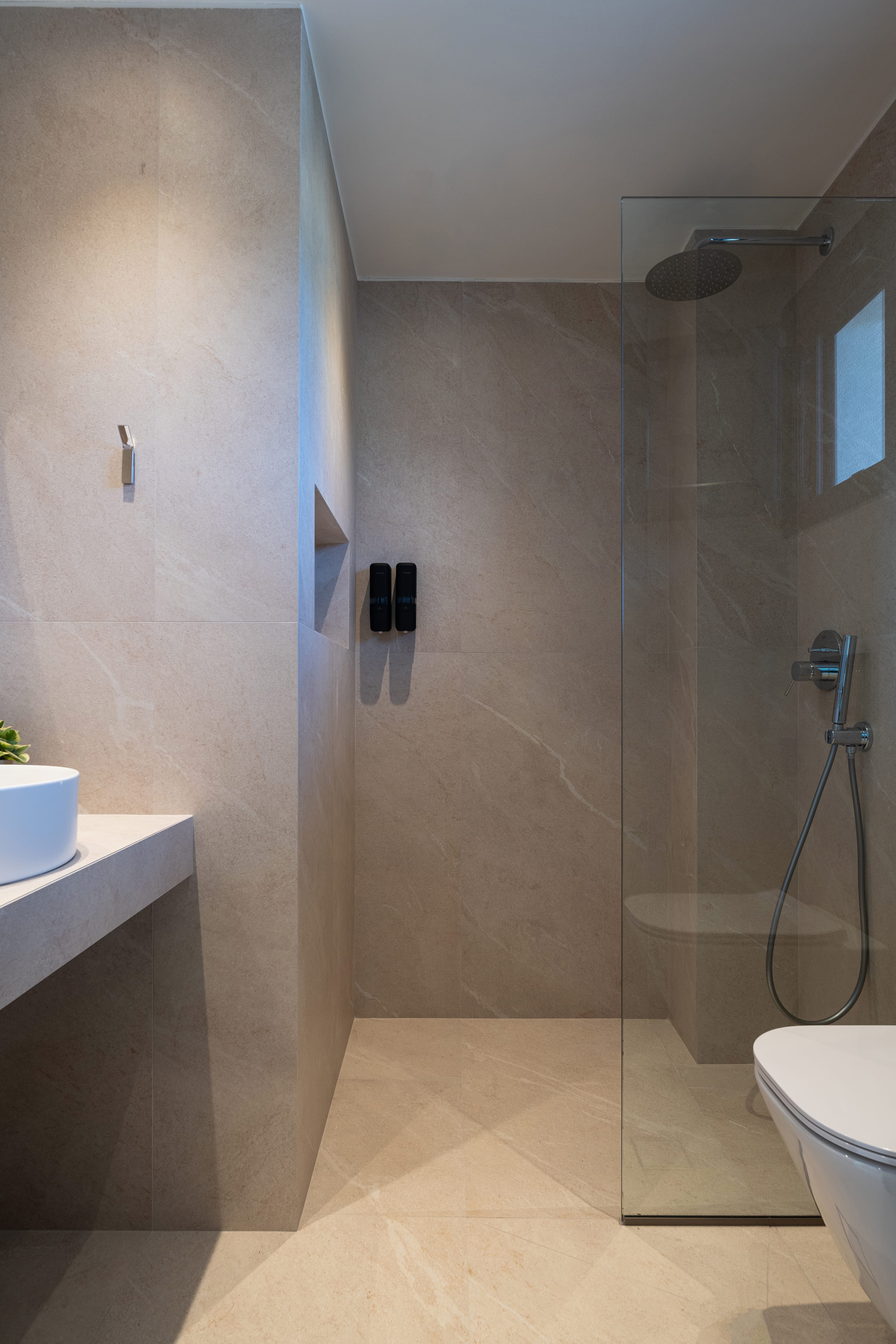 a bathroom with a shower unit