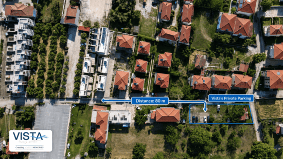 aerial view of a neighborhood with a road and houses