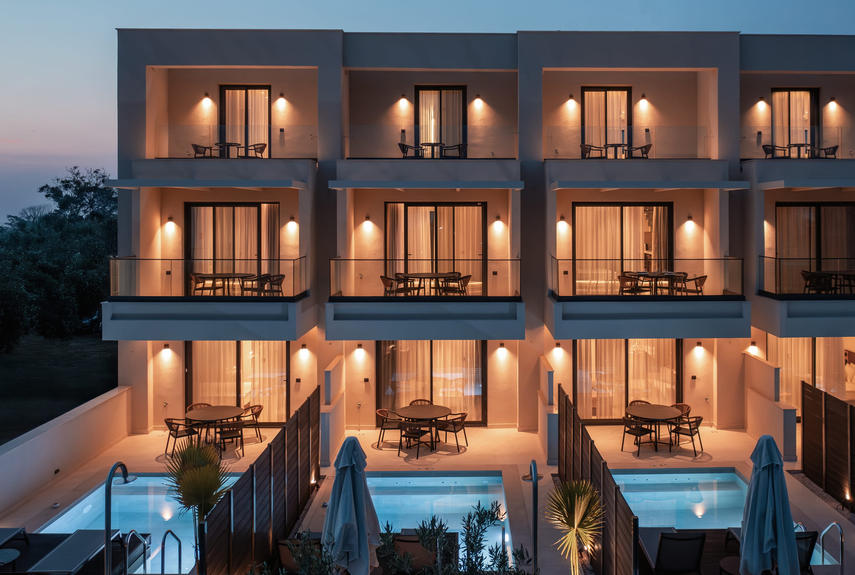 a house with a pool and a deck with a pool