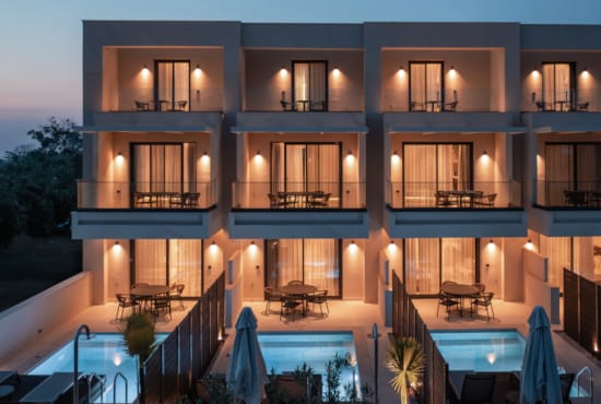 a house with a pool and a deck with a pool