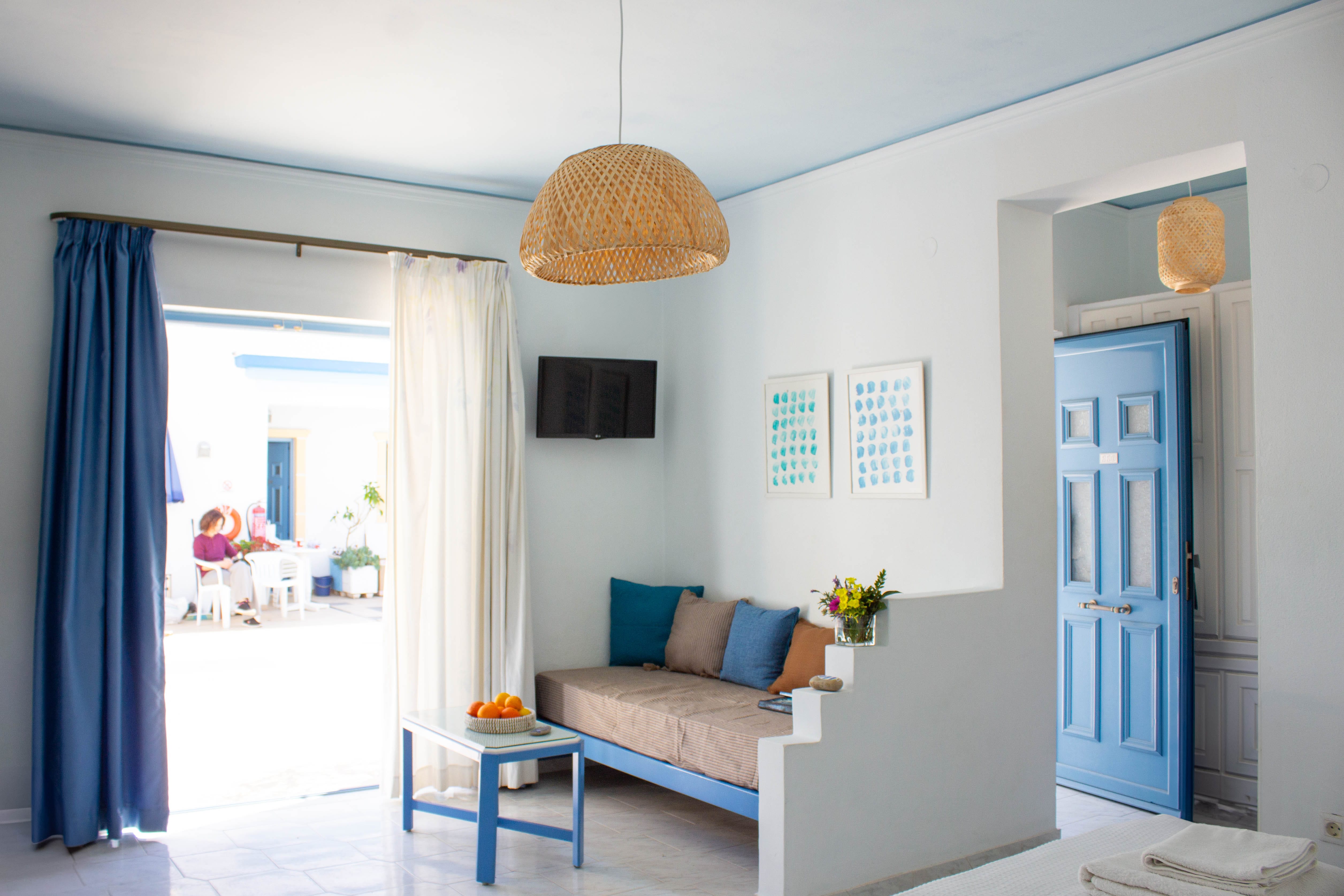 a living room with a couch and a table