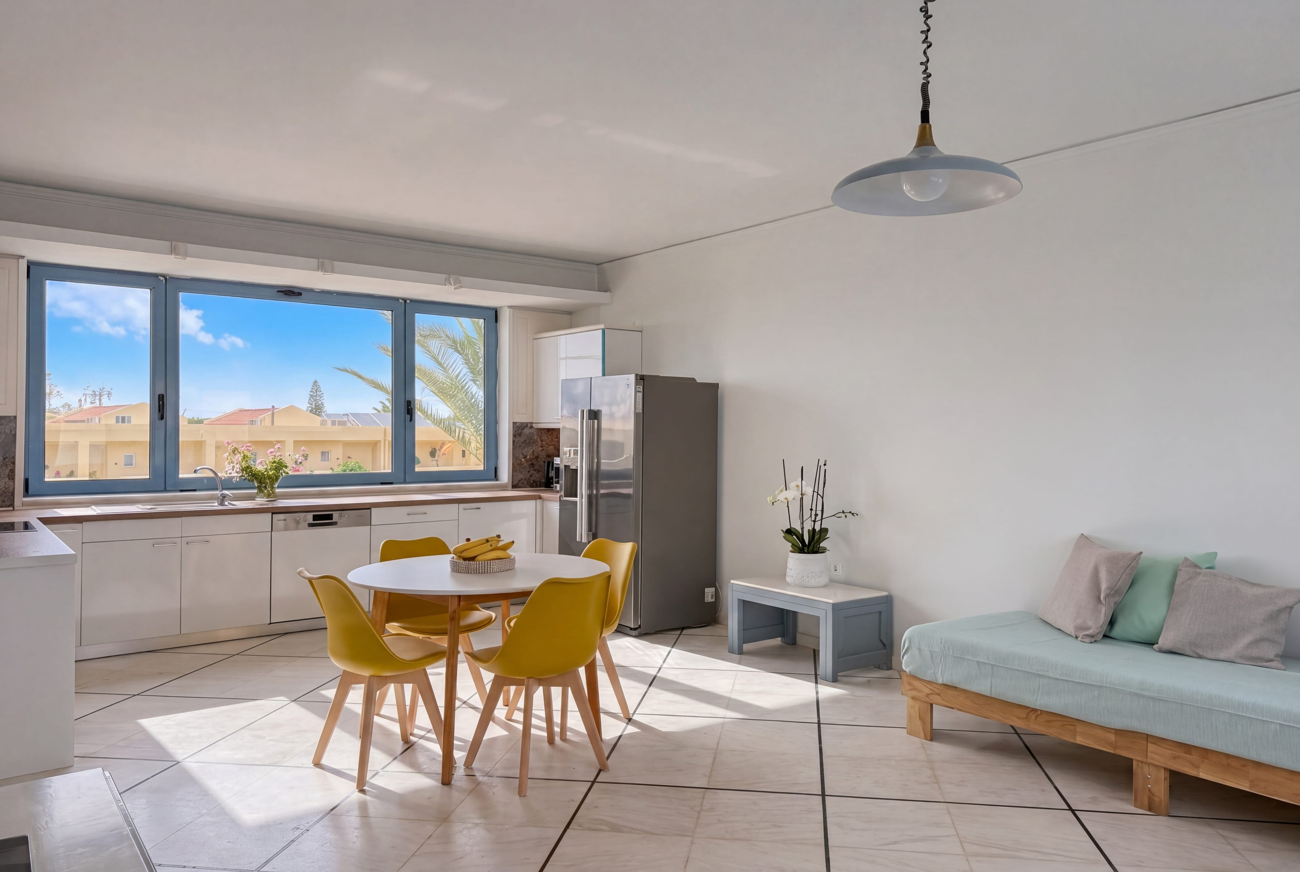 a room with a table and chairs