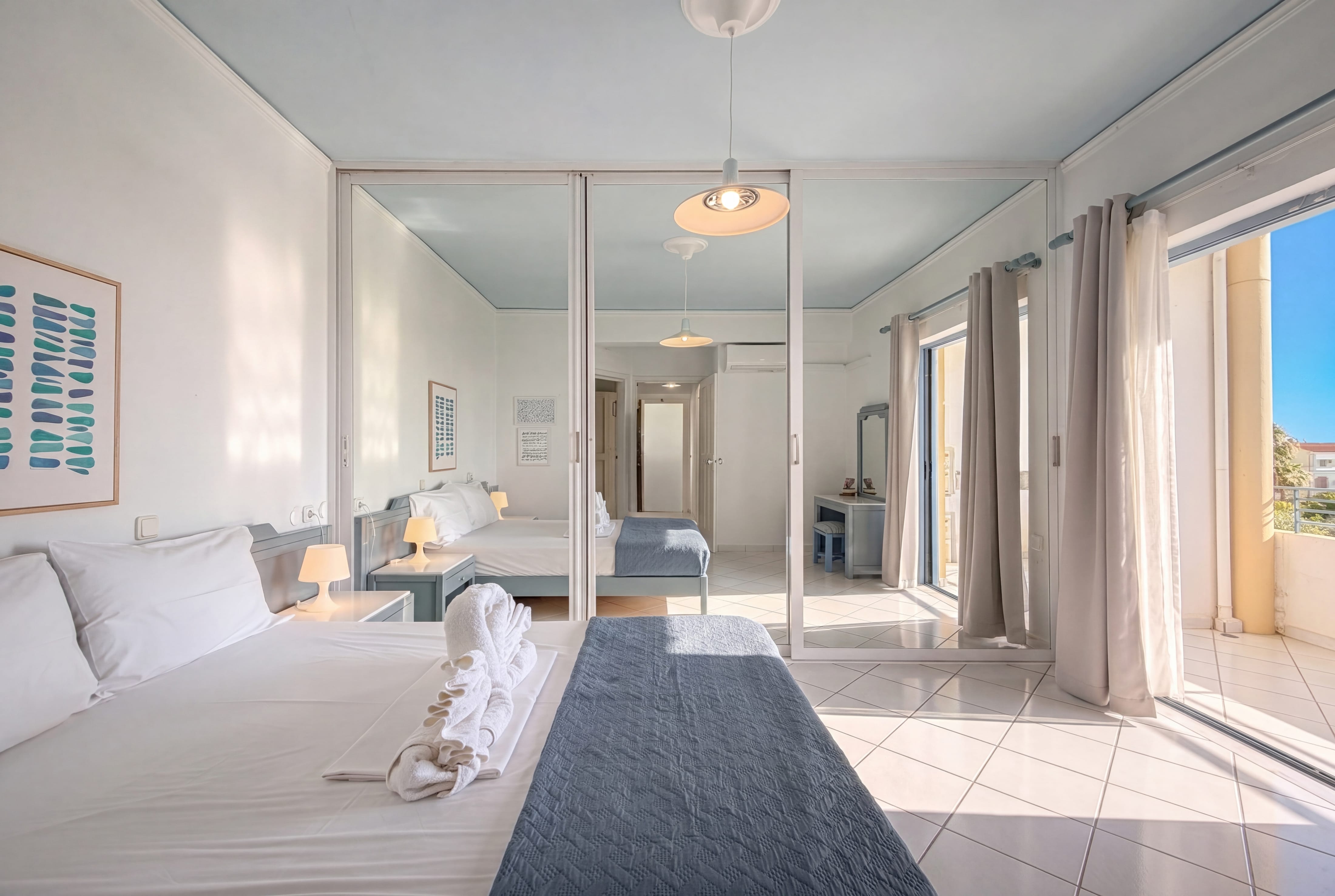 a bedroom with a glass door