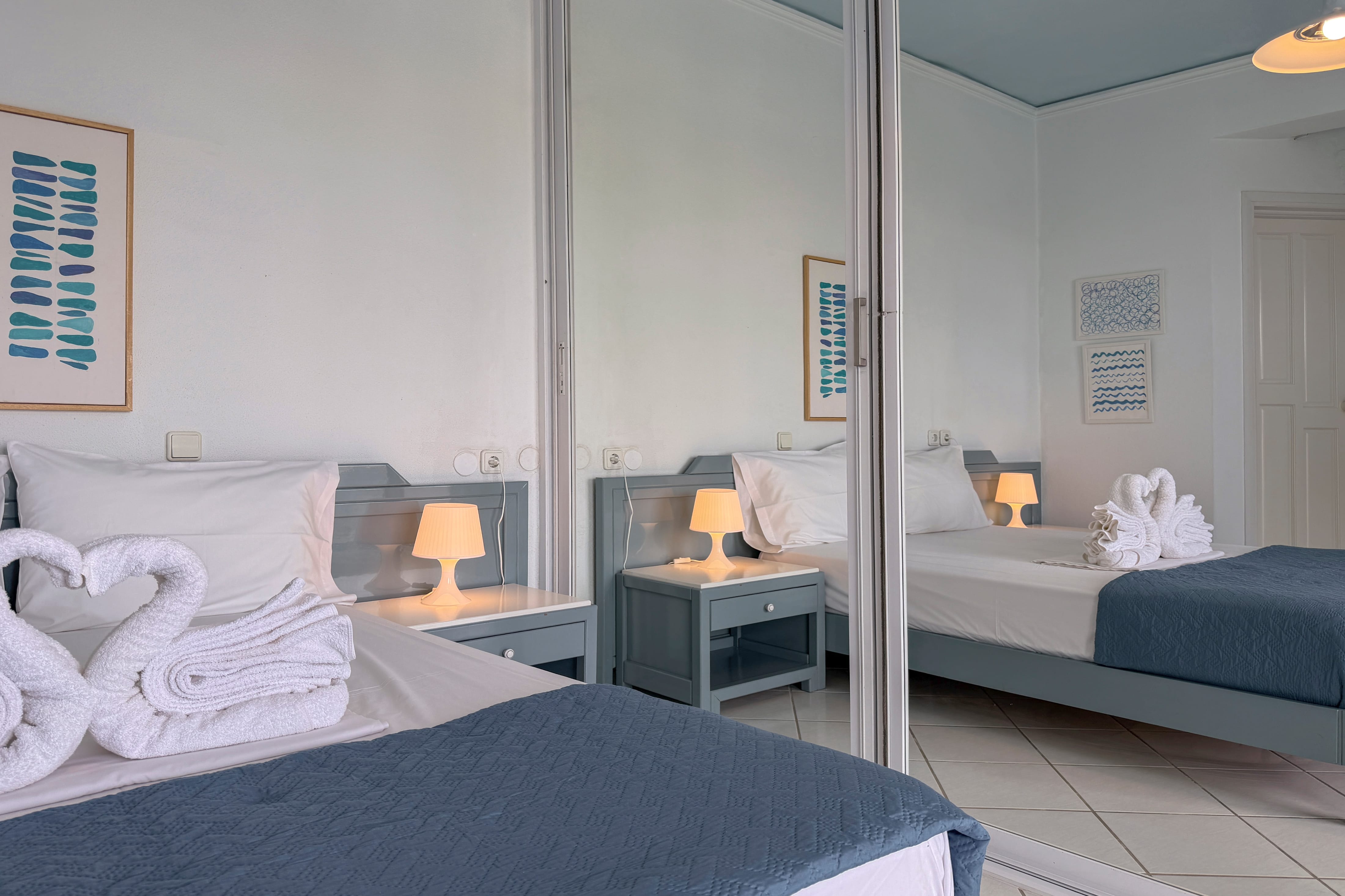a bedroom with a mirror