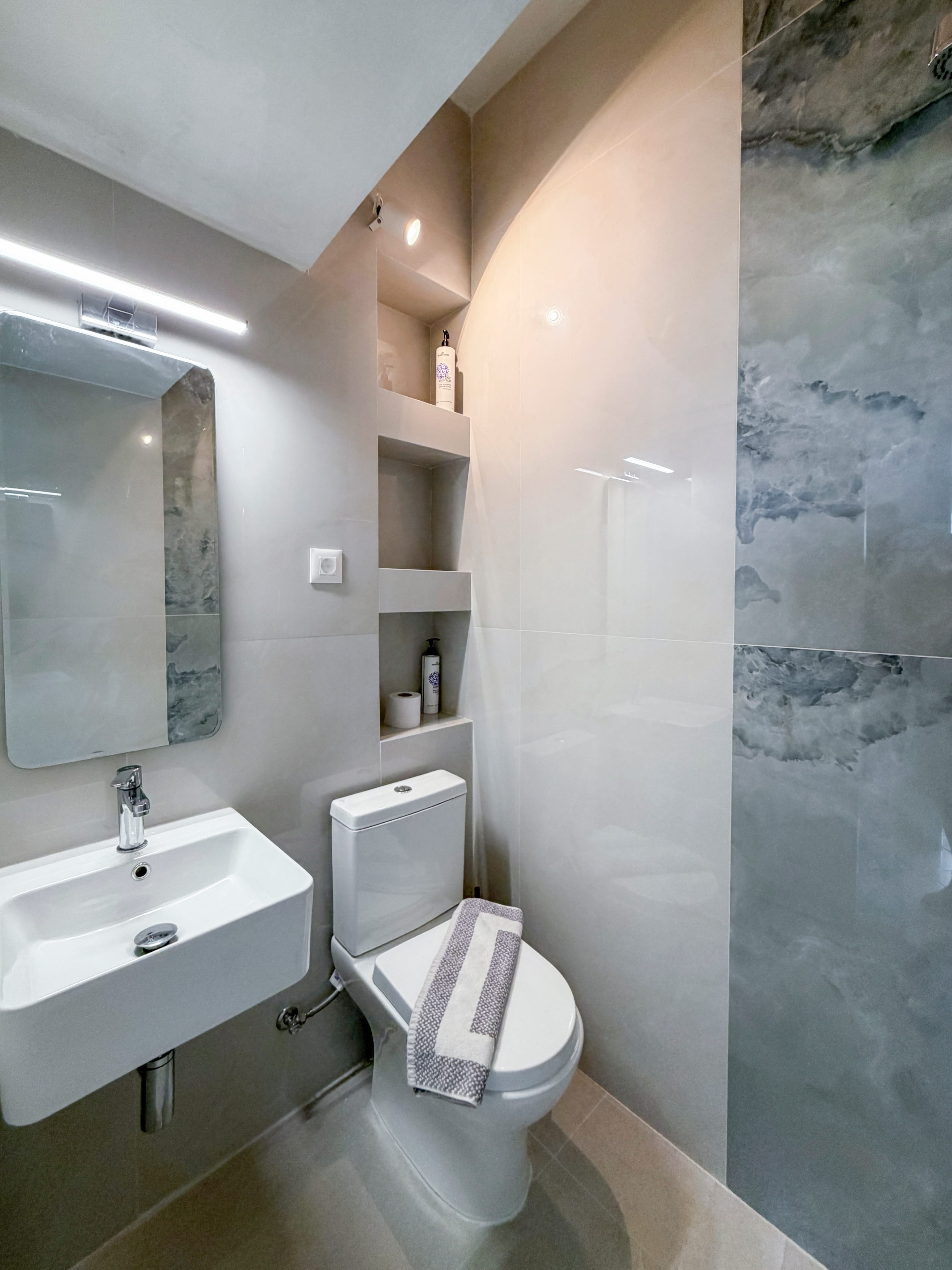 a bathroom with a sink and toilet
